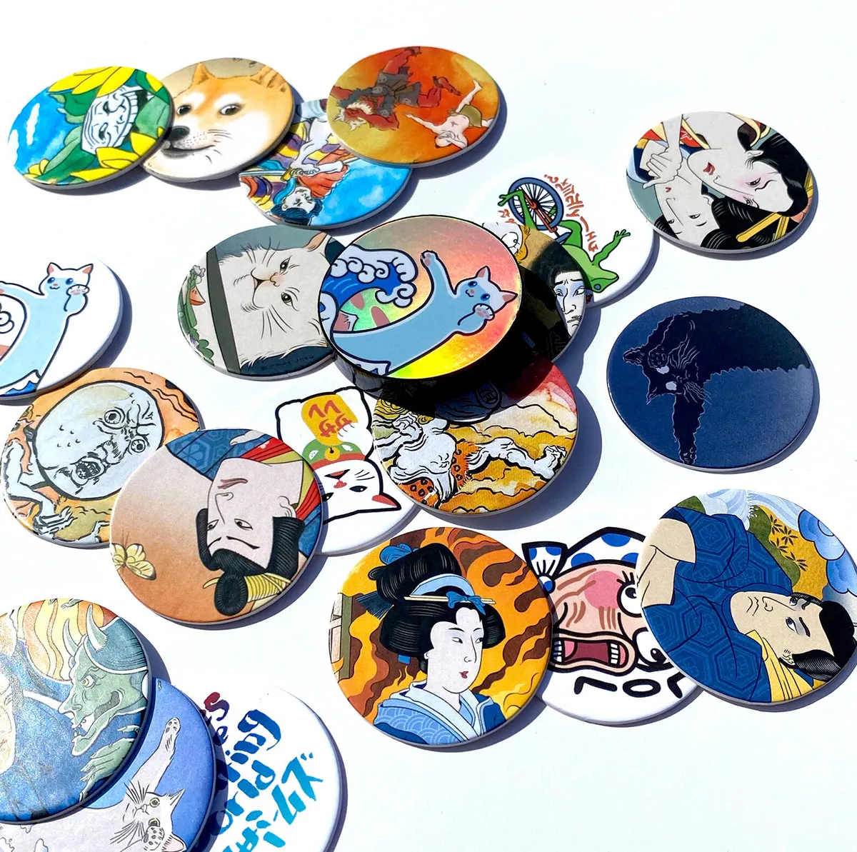 A photo of a collection of pogs with ukiyo-e inspired artwork on them